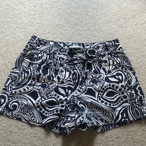 navy and white patterned shorts